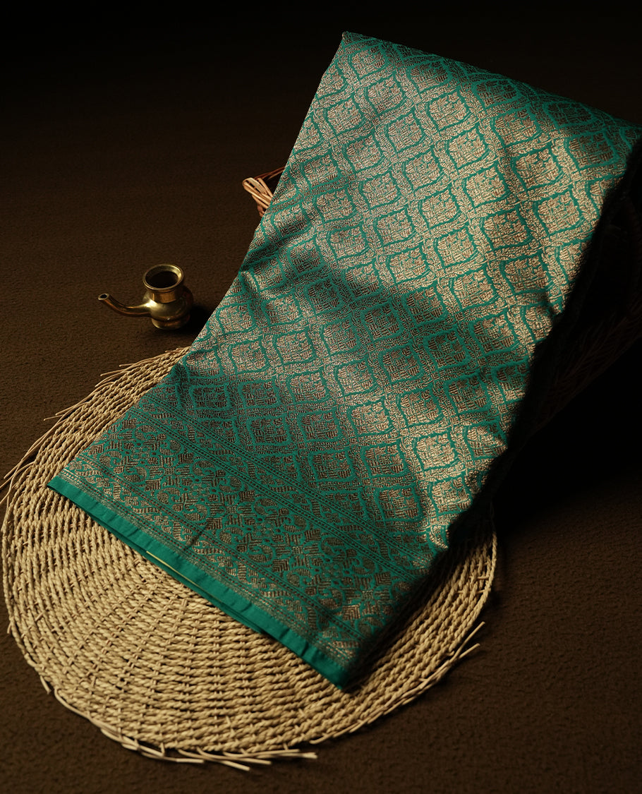 Forest Green Colour Semi Banarasi Katan Silk Saree with Gold Zari Buti Motifs, Traditional Gold Floral Pallu, Elaborate Woven Border, Decorative Tassels with Matching Blouse