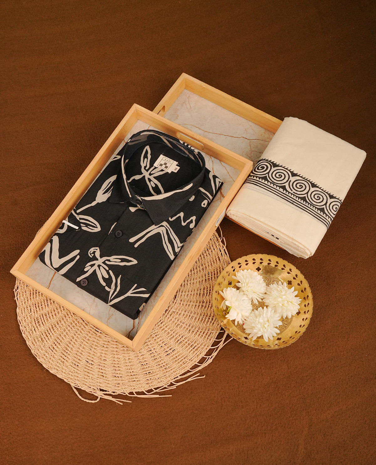 Black colour colour shirt featuring cream Floral Pattern printed body, paired with cream colour double dhoti featuring Black printed border.