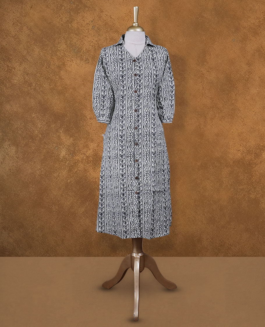 Gray colour button down kurti BY VISMAY with an all over black Geometric & floral print, straight calf length silhouette, classic shirt collar, and elbow length sleeves.