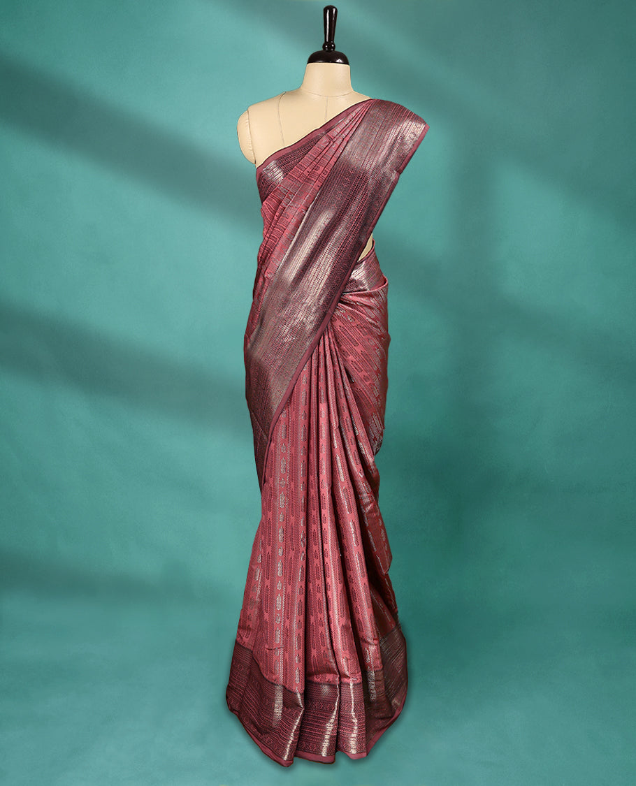 Deep Rose Art Soft Silk Saree showcases intricate silver zari work on the body and border, paired with a matching blouse
