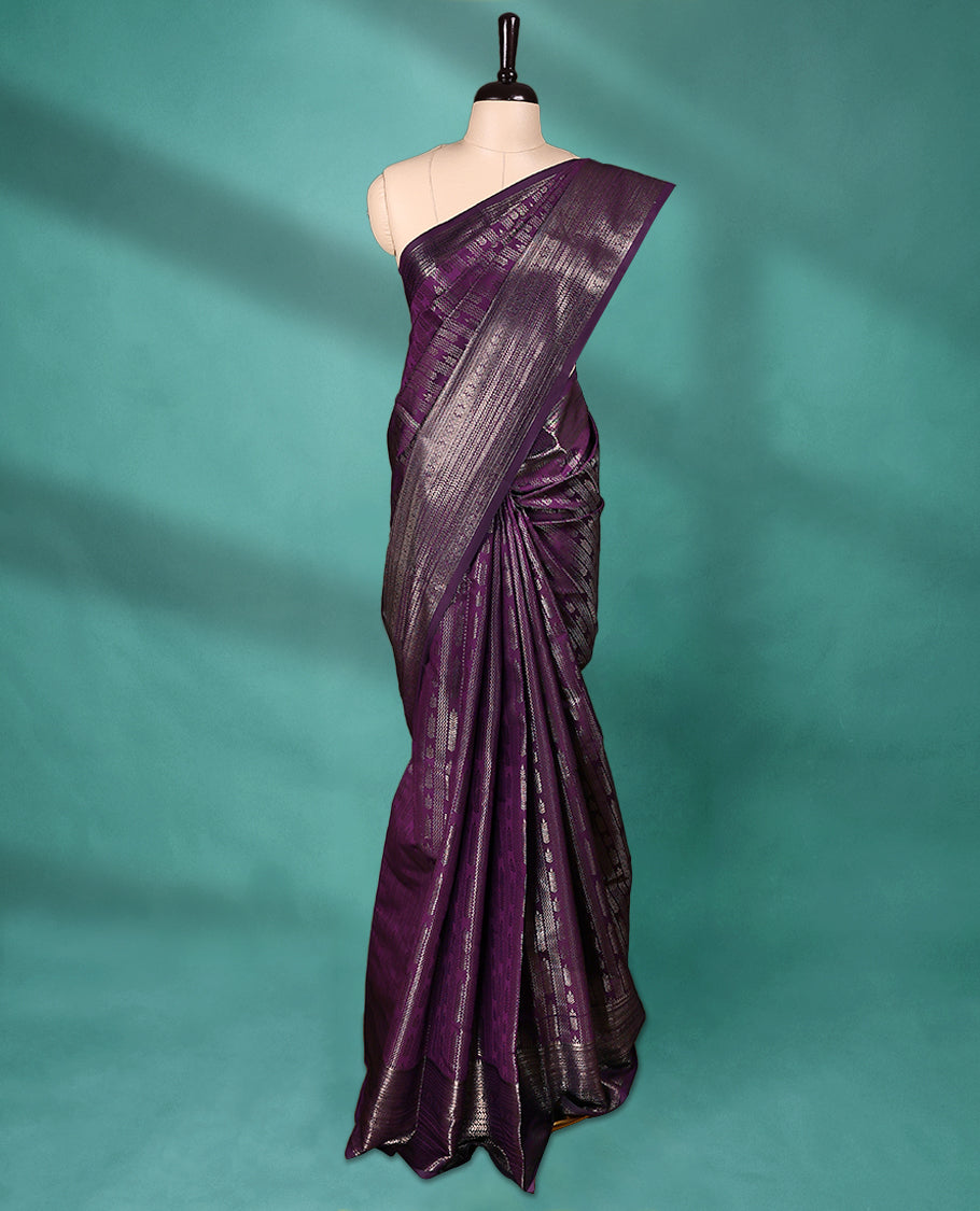 Regal Purple Art Soft Silk Saree showcases intricate silver zari work on the body and border, paired with a matching blouse