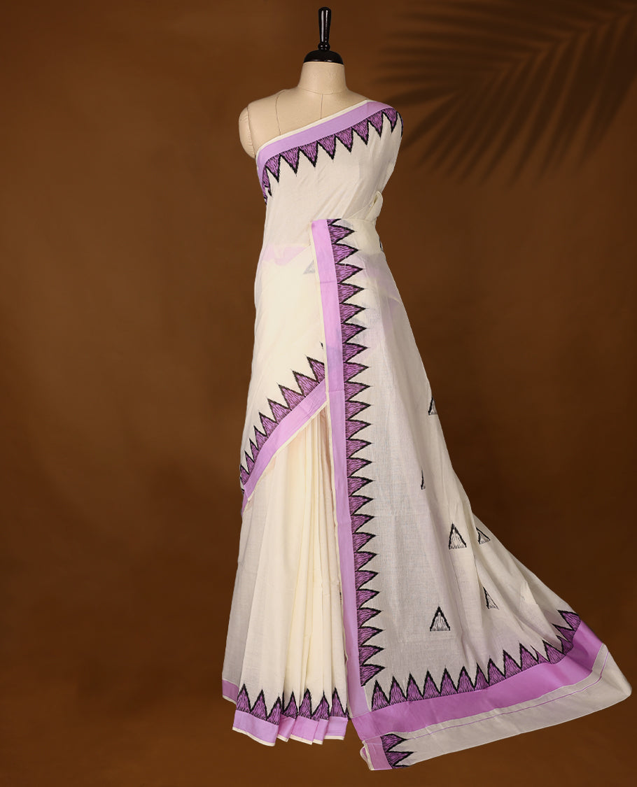 Elegant off white colour cotton Kerala saree featuring Plain body, Lavender colour border with temple designs, Paired with matching blouse offering a classic and graceful look, paired with a matching blouse.