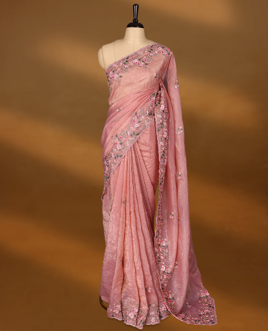 Pastel Pink Crush Soft Silk saree featuring Floral Thread Works on the body, complemented by delicate floral embroidery border and a matching blouse.
