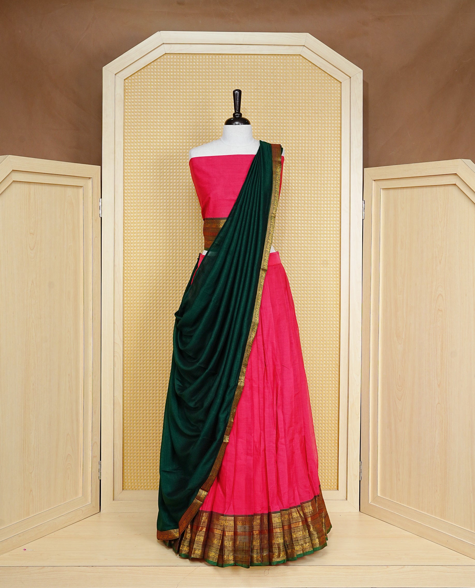 Red colour Semi Stitched Dhavni set Featuring Red Skirt With Contrast Green colour with Zari border, paired with UnStitched Blouse & Elegant Dupatta.