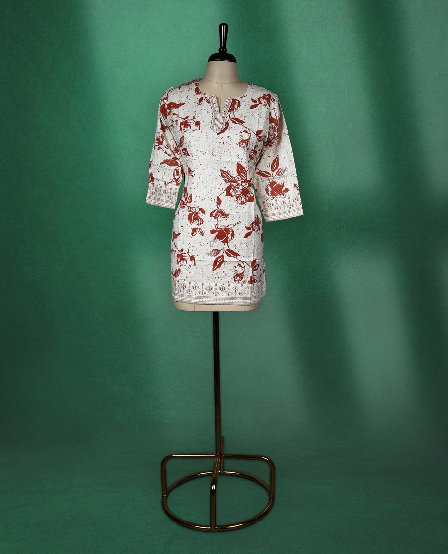 Beige colour short kurti with brown floral prints and intricate border detailing on the hem and sleeves, featuring a V slit round neckline and 3/4th sleeves, perfect for everyday comfort and style.