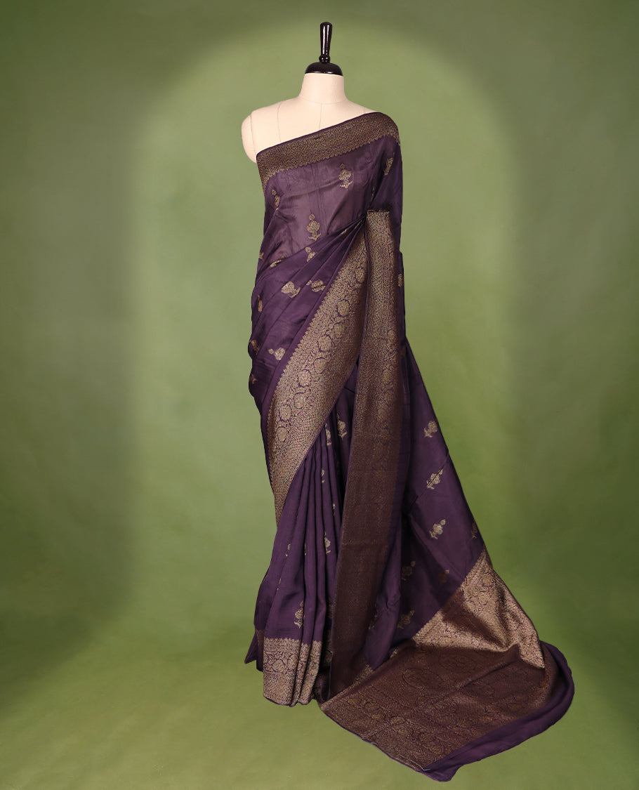 Black Currant semi-Banaras tussar georgette saree embellished with antique zari motifs across the body, complemented by a rich heritage Banaras border and paired with a matching blouse.