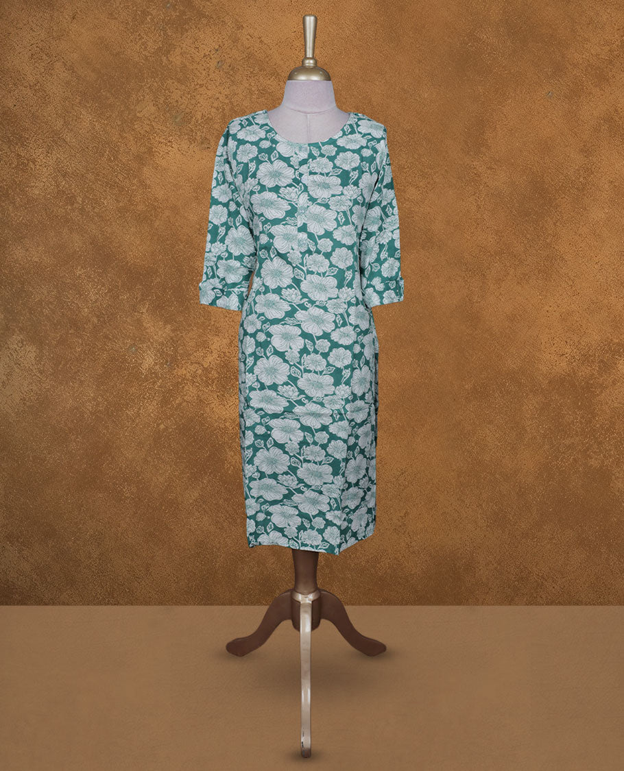 Dark green and white colour kurti with White floral prints, knee length design, styled with a round neckline and a sleeve .