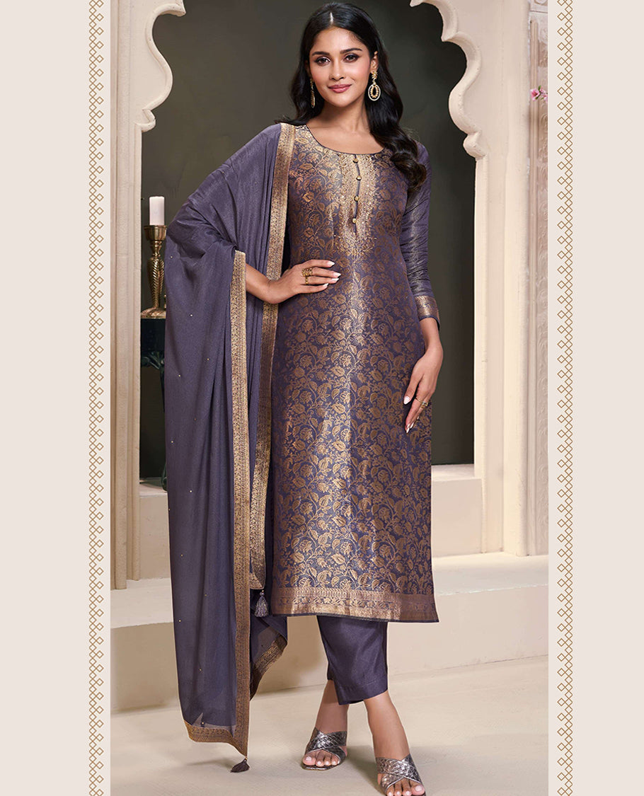 Pastel Purple Colour hand-worked shimmer jacquard top, paired with a santoon bottom and a silk georgette dupatta.