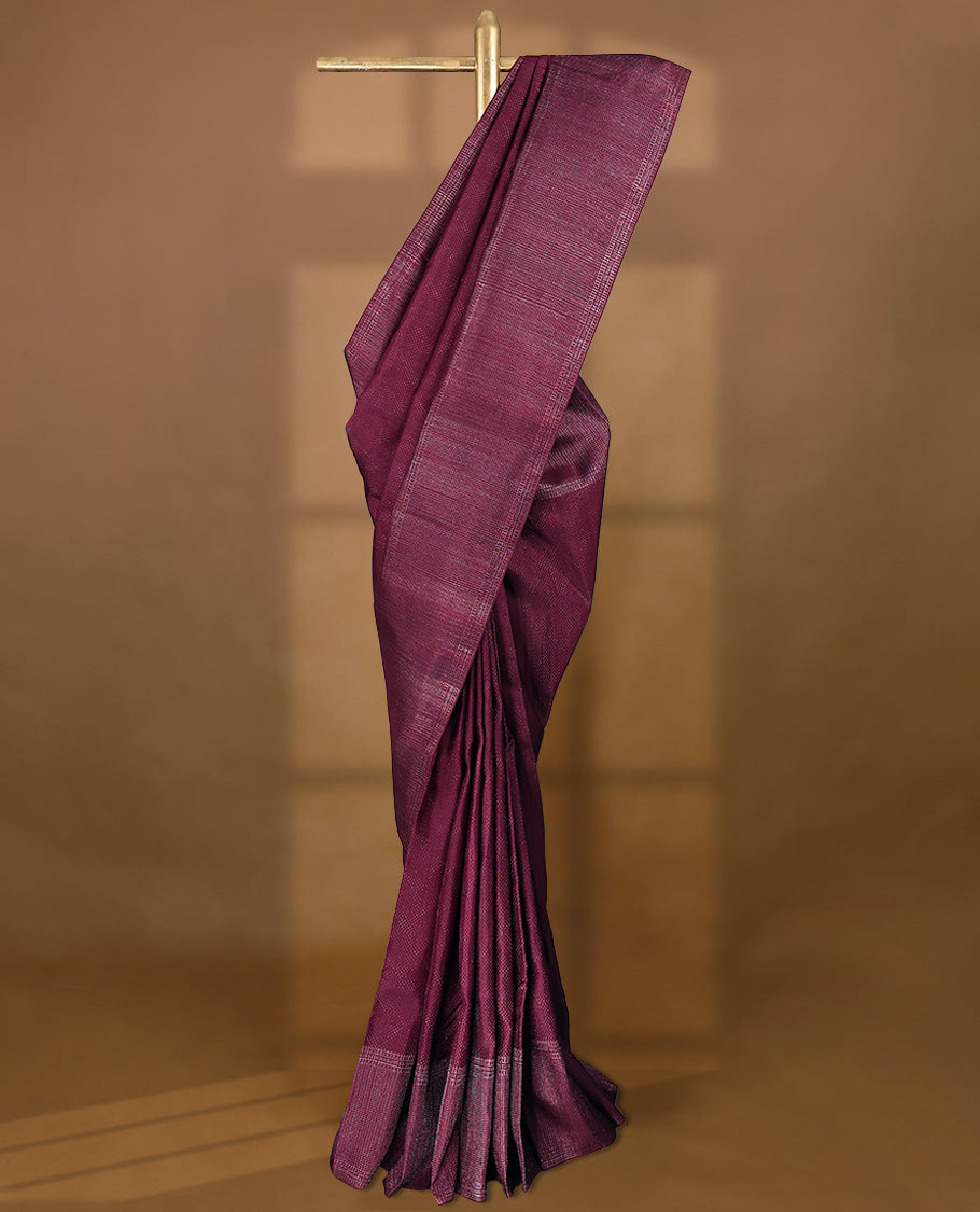 Dark Maroon coloured Manthrakodi saree featuring a multicoloured zari jacquard body, complemented by a self coloured turning Banarasi border and a matching self coloured blouse.