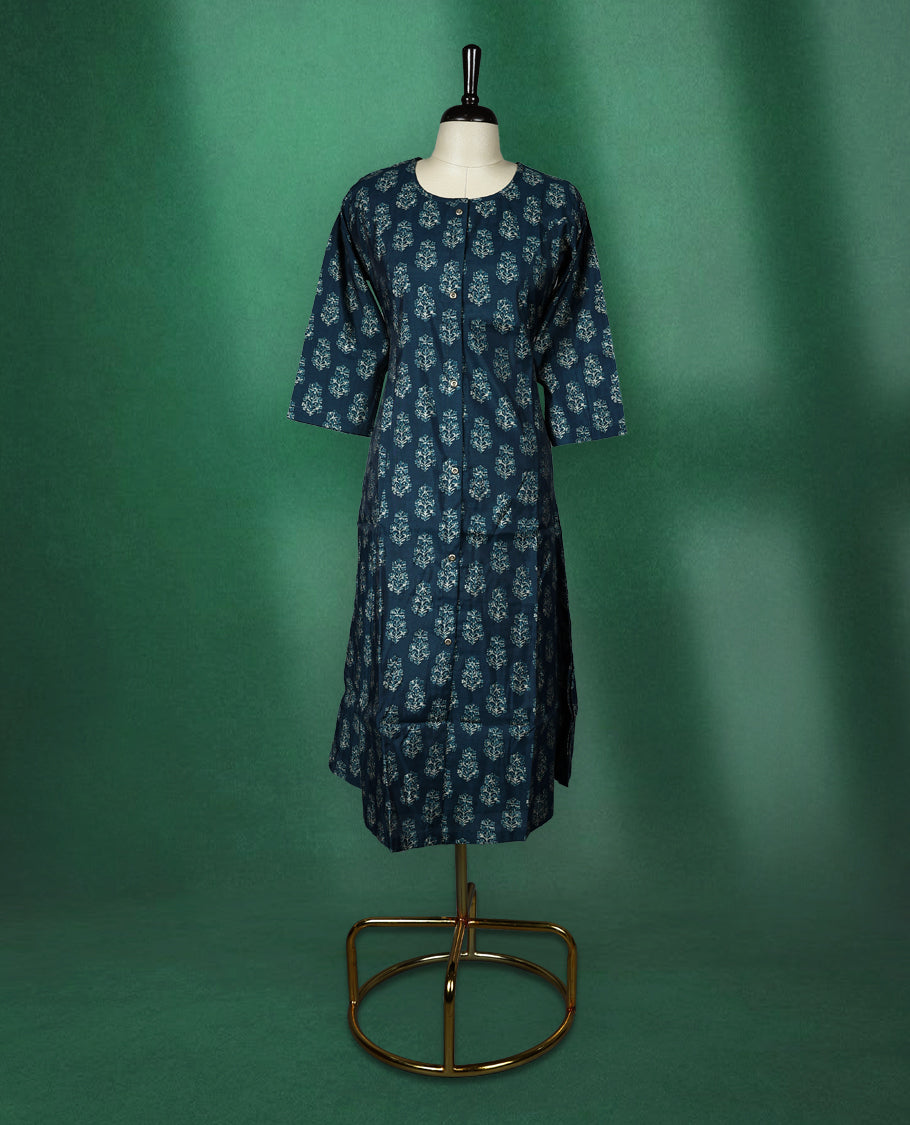 Navy blue colour kurti with a round neck and three quarter sleeves, featuring elegant light blue floral block prints for a classic ethnic look, perfect for casual outings or semi formal occasions.