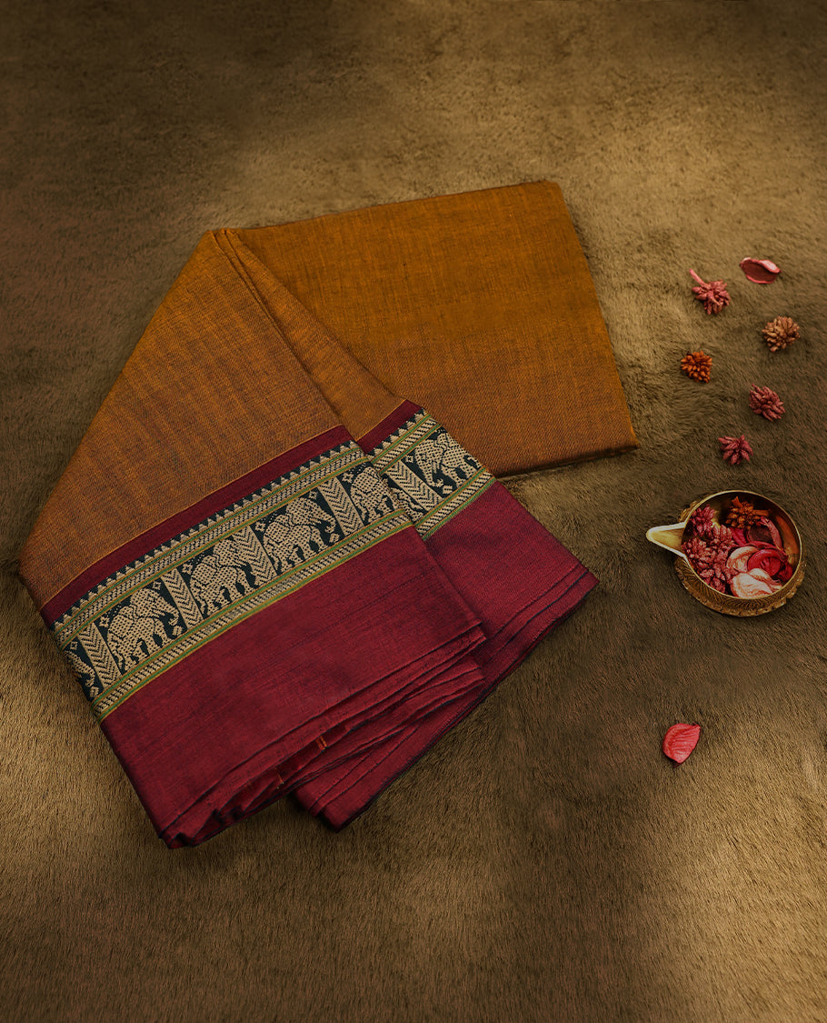 Dark Mustard Colour Mixed Chettinad Cotton Saree having Plain Body with Contrast Border and Self Coloured Blouse