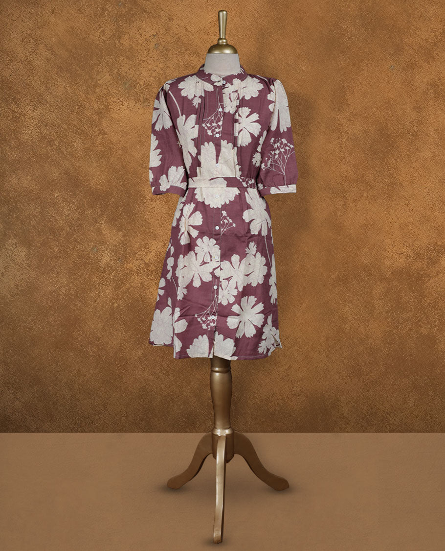 Wine maroon floral printed knee-length shirt dress with band collar, pintuck-detailed yoke, matching waist belt, and half sleeves.