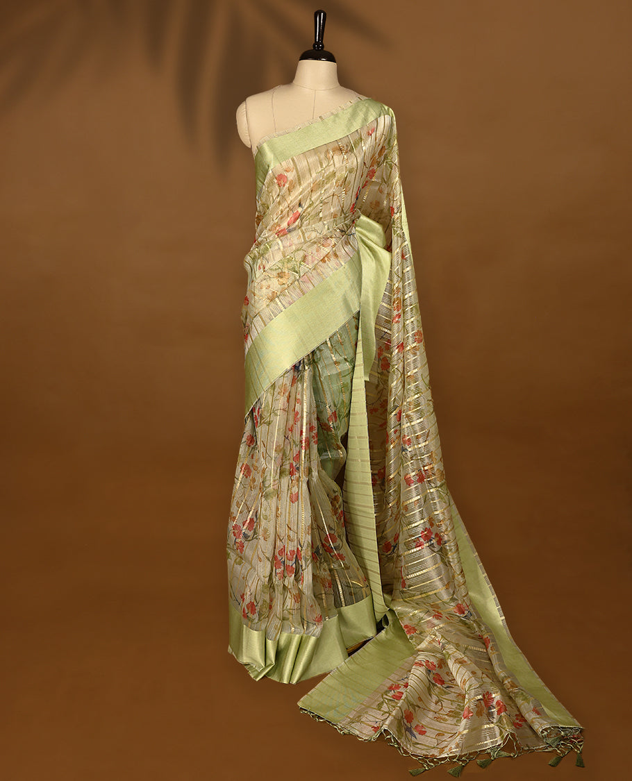 Pista semi-organza saree with intricate floral jaal work, elegant border, and a matching silk brocade blouse.