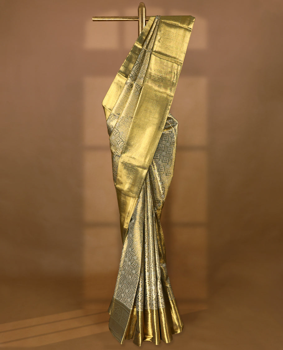 Light Golden Colour Kancheepuram Tissue Silk Saree having Self Coloured Zari Worked Body with Brocade Border and Blouse