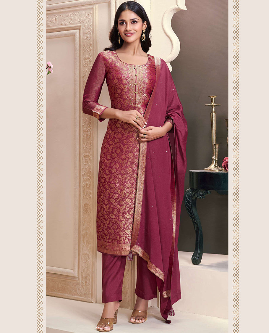 Wine Colour hand-worked shimmer jacquard top, paired with a santoon bottom and a silk georgette dupatta.