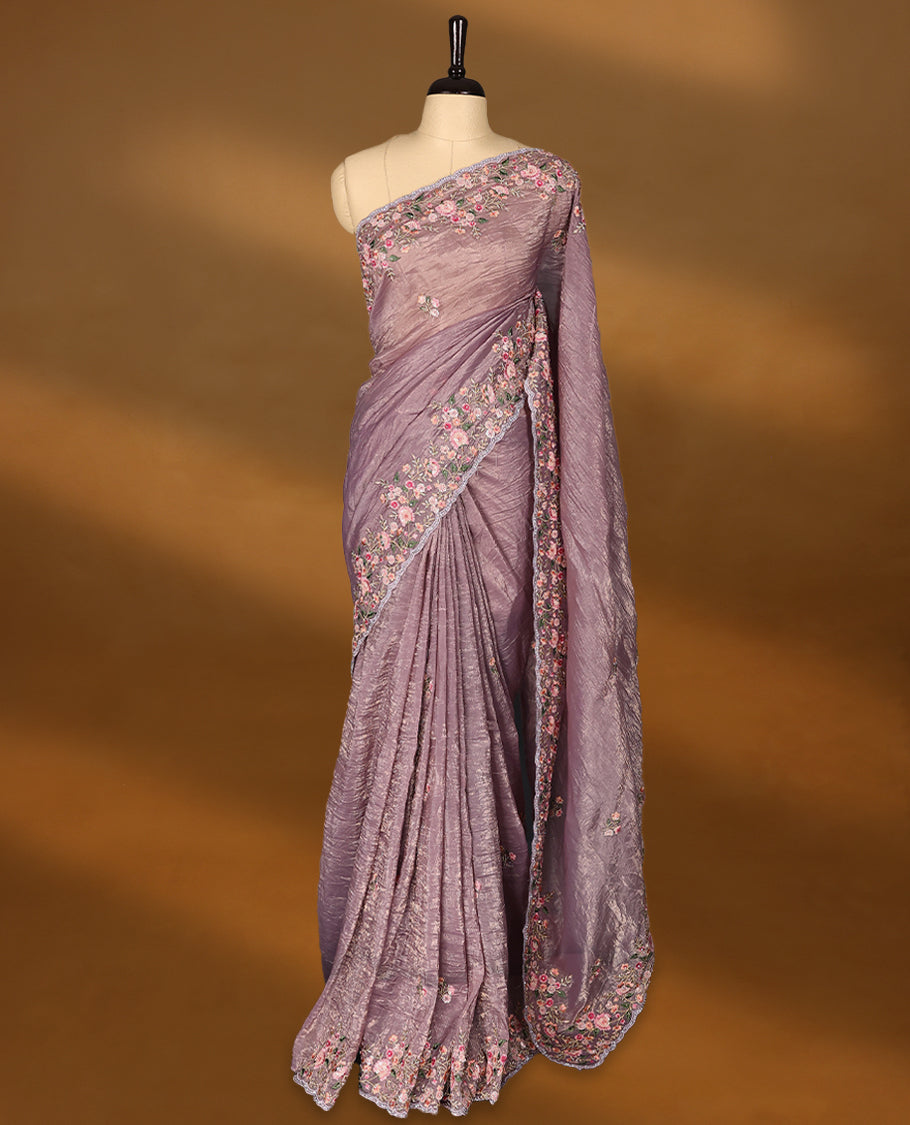 Mauve Crush Soft Silk saree featuring Floral Thread Works on the body, complemented by delicate embroidery in pink and green tones border and a matching blouse.