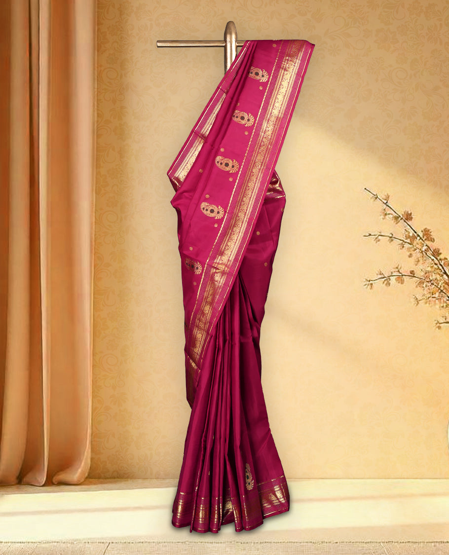 Araku colour pure Kancheepuram saree with gold zari small chackra motifs on the body traditional border with Meena mango motifs grand pallu with Vangi design paired with matching blouse