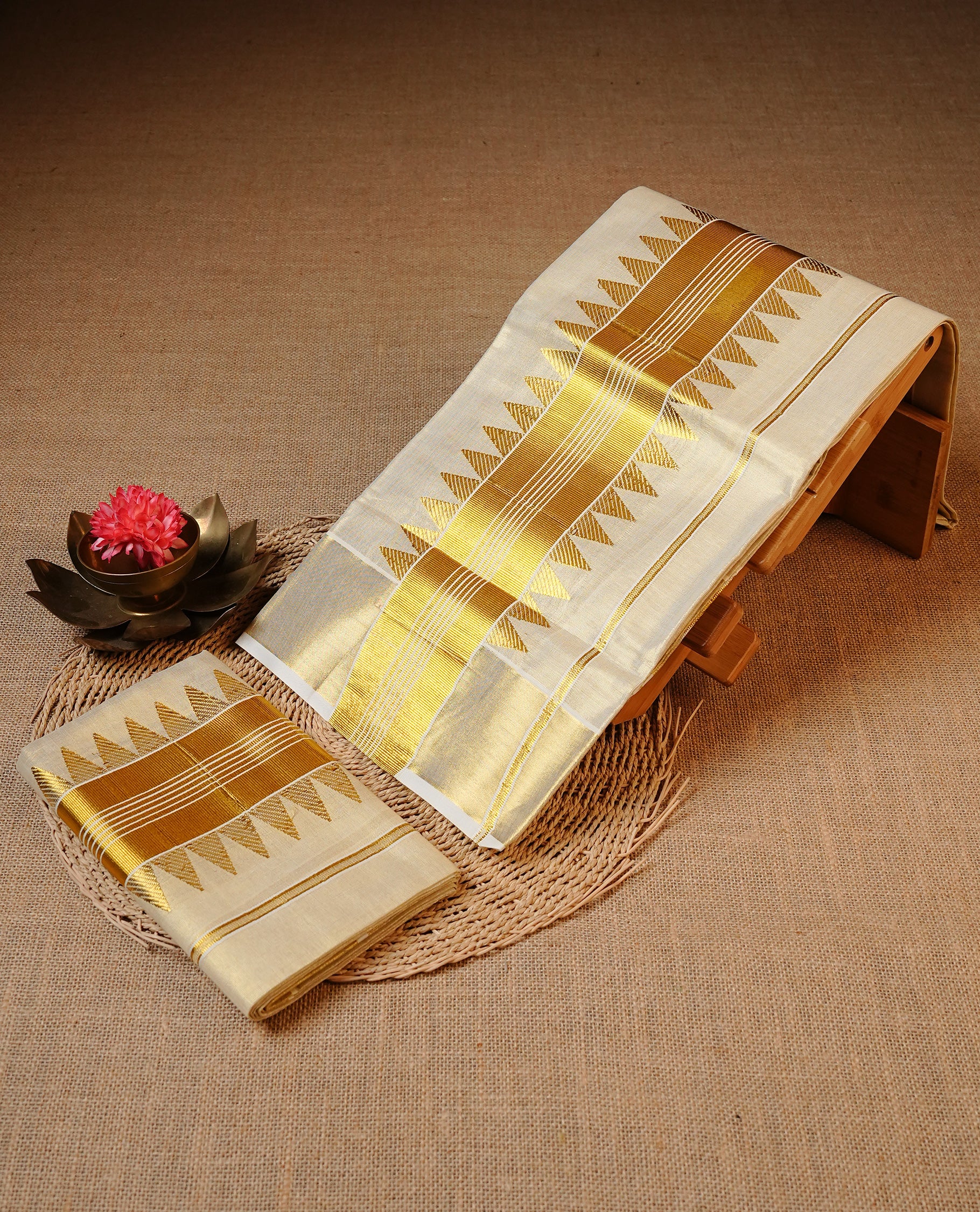 Cream colour Tissue silk set mund Featuring Elegant plain body, Complemented by Gold zari temple design border.