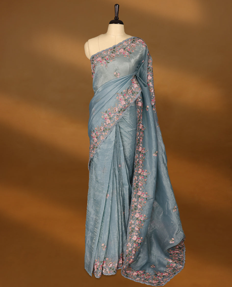 Dusty Blue Crush Soft Silk saree featuring Floral Thread Works on the body, complemented by delicate floral embroidery border and a matching blouse.