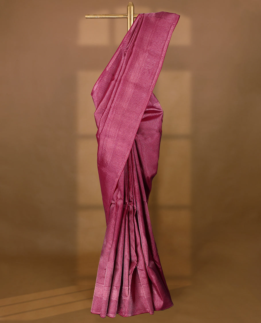 Dark pink Colour Manthrakodi saree featuring an antique zari brocade pattern on the body, complemented by a traditional Laddu Kamalam brocade border and a matching brocade blouse.