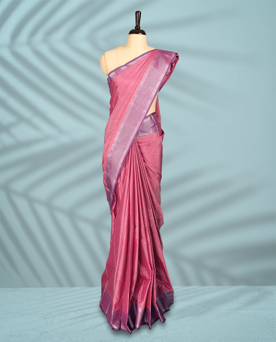 Rose pink Colour semi silk saree features delicate silver thread checks all over, paired with a Plum Colour zari border and a matching blouse