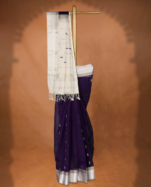 Purple colour Maheshwari Cotton saree featuring Antique Zari Patterns across the entire body, complemented by a traditional White coloured border & Pallu, with a matching blouse.