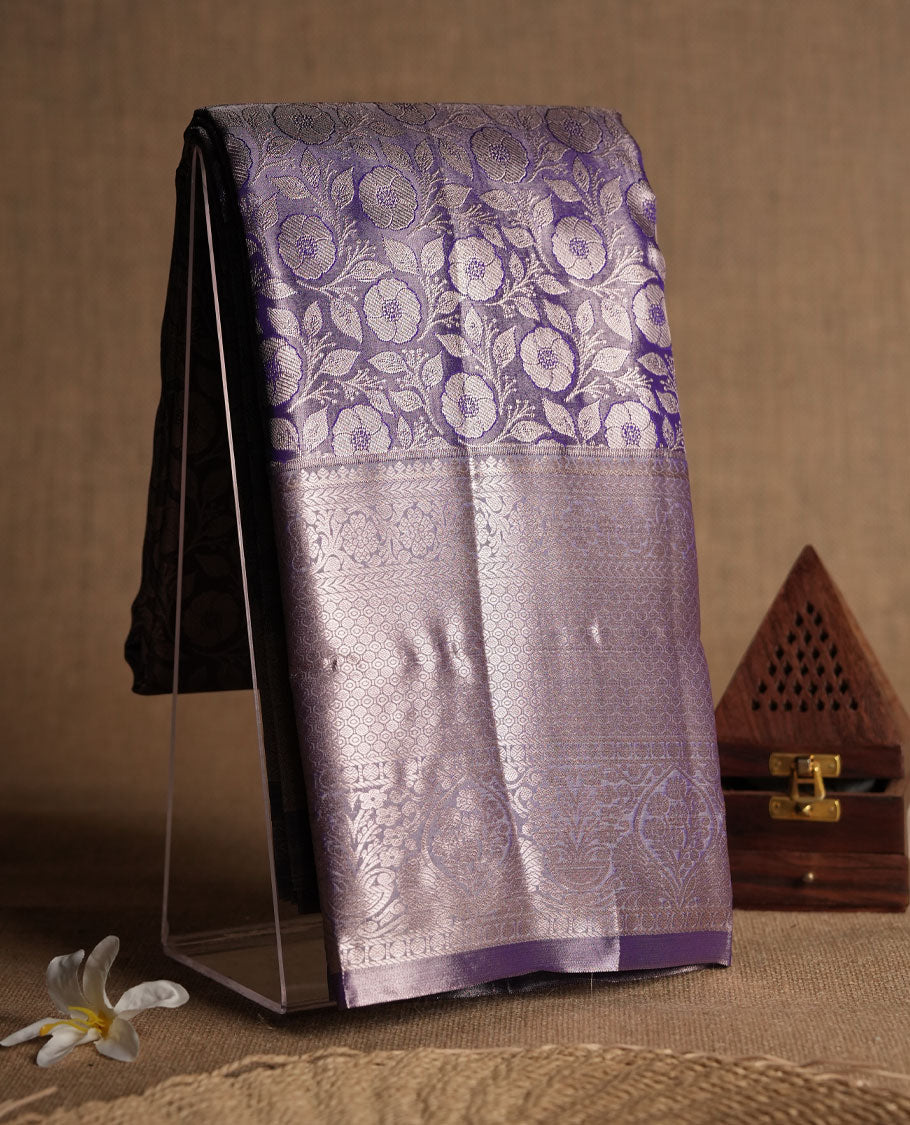 Purple colour and Antique silver Zari Tissue Brocade Saree features intricate Motifs on body and traditional border & pallu with floral patterns, paired with matching blouse
