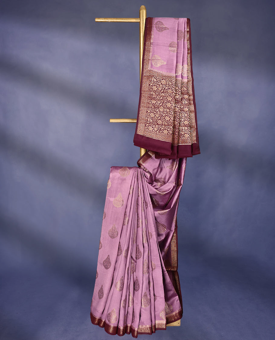 Onion Colour Pure Banaras Soft Silk Saree adorned with traditional antique zari motifs, paired with a hand dyed Dark Maroon antique style border and a matching blouse.