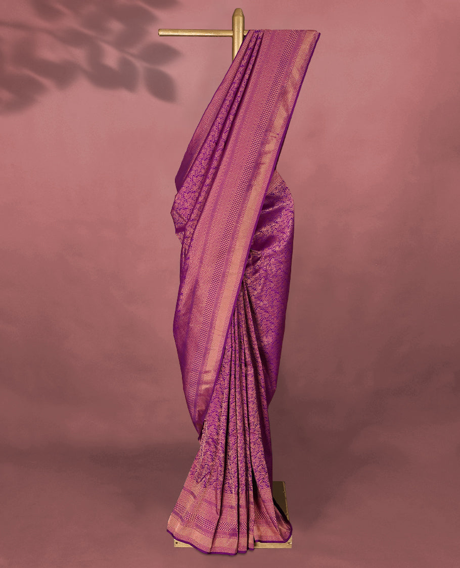 Vadamalli colour Kancheepuram saree featuring an antique zari brocade body, complemented by a traditional border and a matching blouse.
