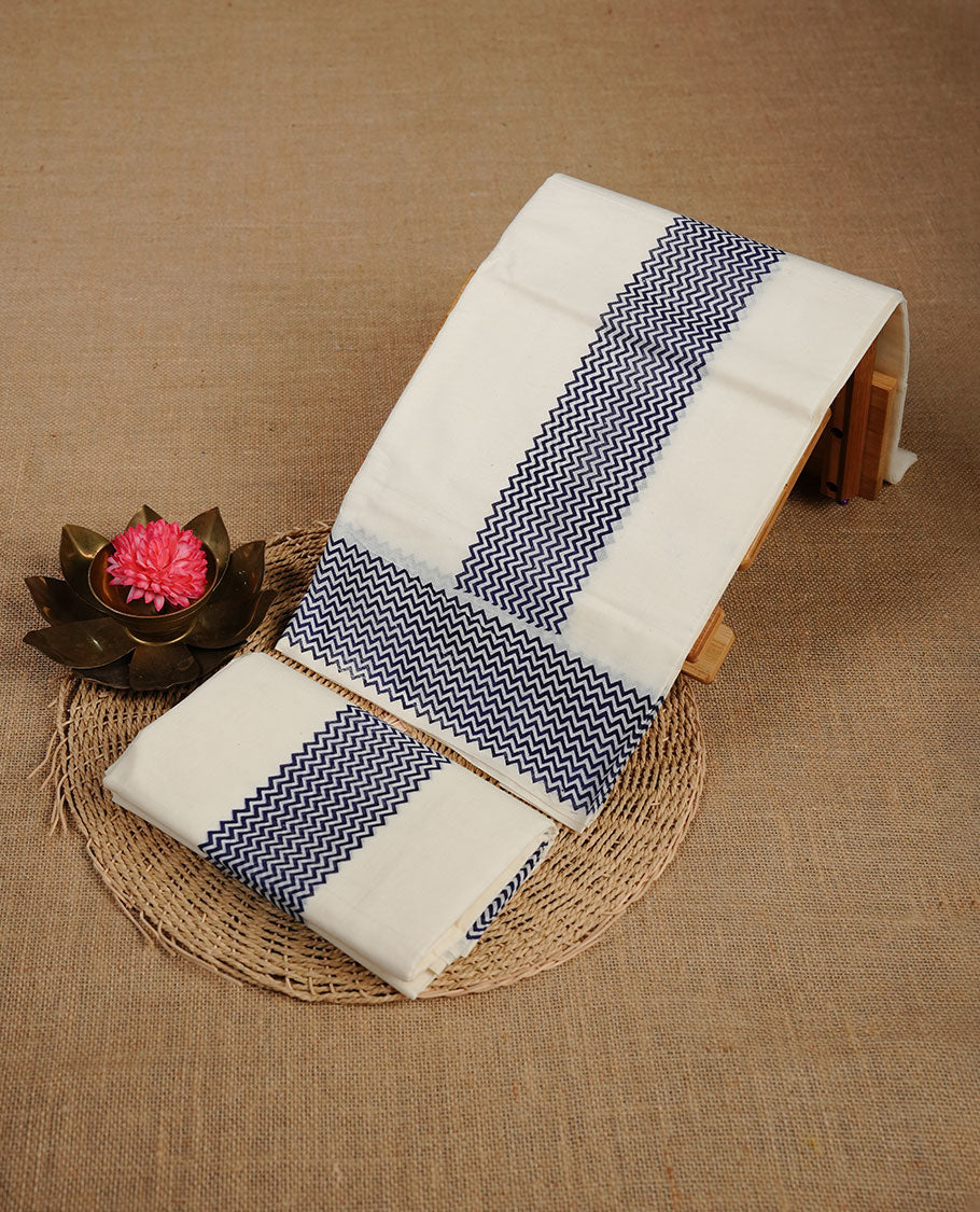 Cream colour cotton set mundu highlighting Navy blue colour zig zag patterned border.