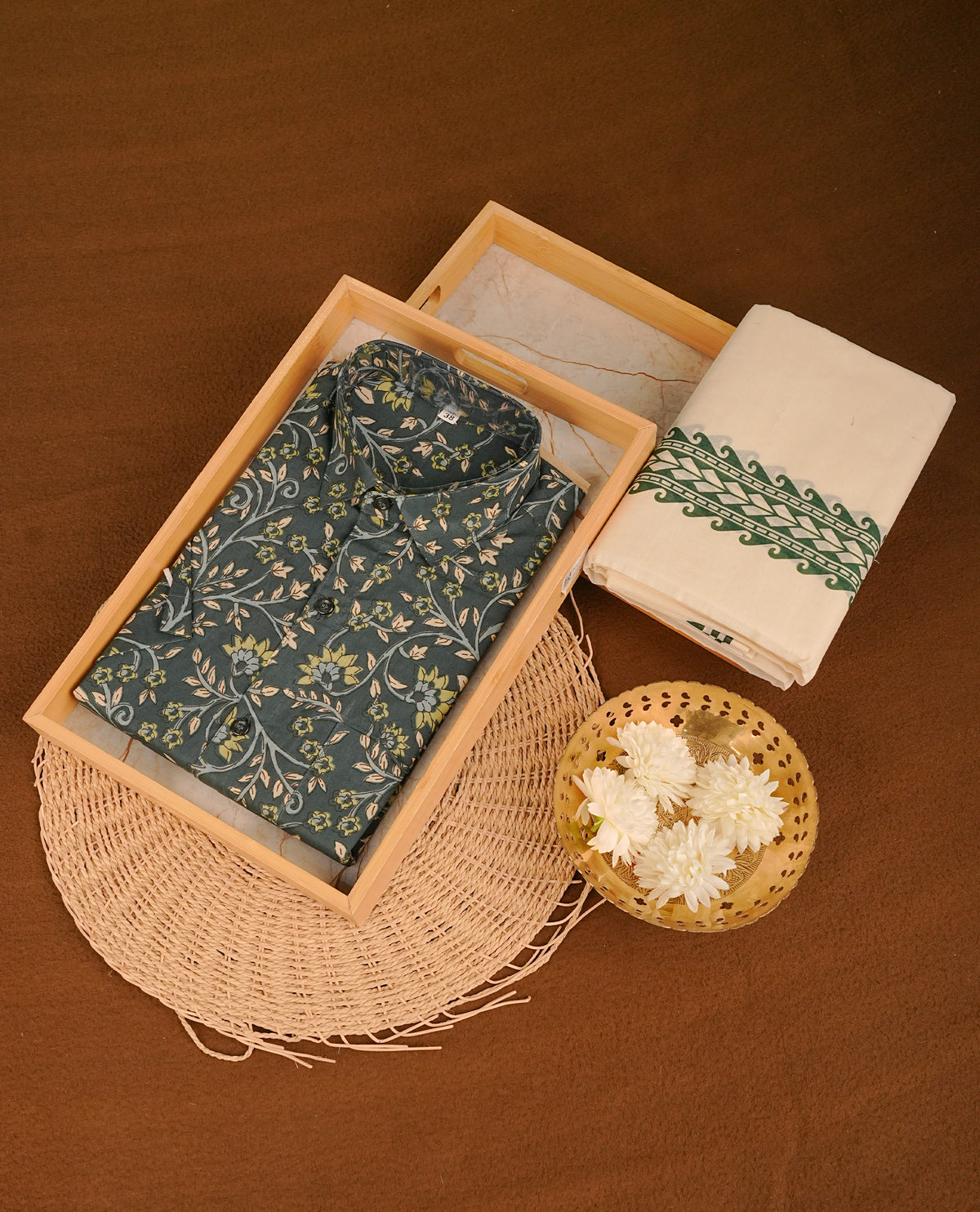 Dark Teal colour shirt featuring Floral Pattern printed body, paired with cream colour double dhoti featuring printed border.