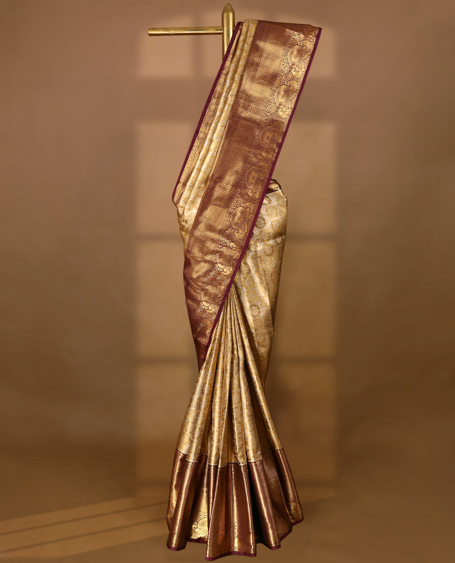 Golden Colour Tissue Semi Silk Saree having Silver Zari Worked Body and Blouse with Dark Brown Border