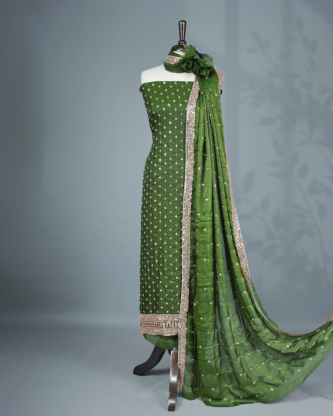 Green colour salwar material with Cut beats & sequins work on body, Matching Bottom & dupatta.