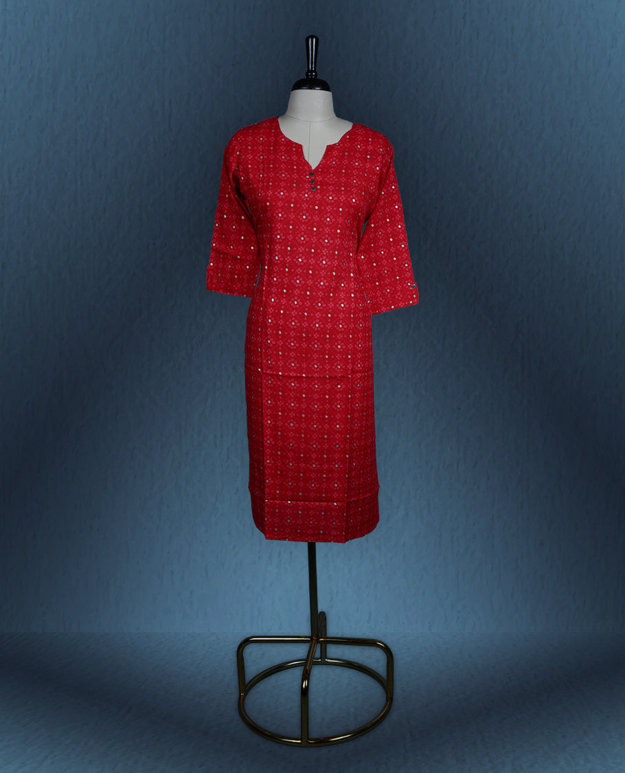 Red colour kurti adorned with an all over small geometric print, styled with a chic notch neckline enhanced by delicate button detailing, and finished with comfortable three quarter sleeves
