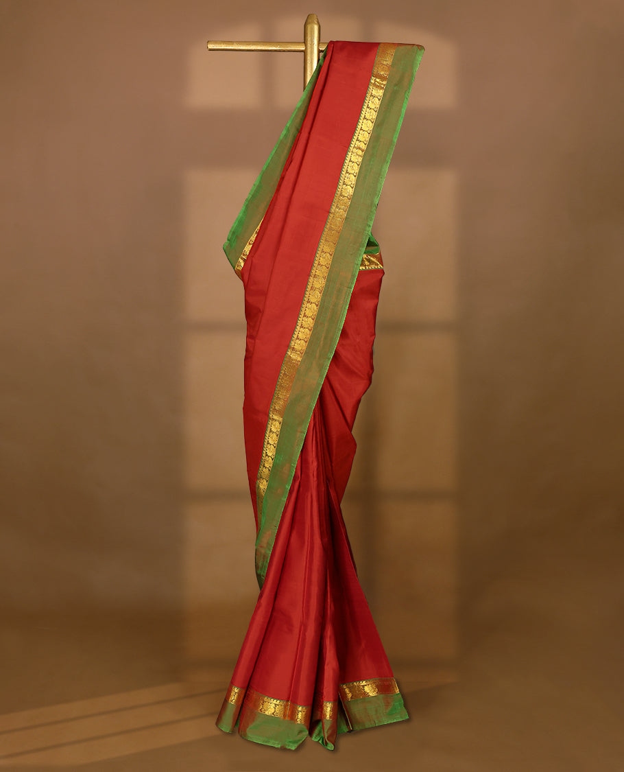 Red Colour Pure Kancheepuram Traditional Silk Saree having Plain Body with Light Green Border and Blouse