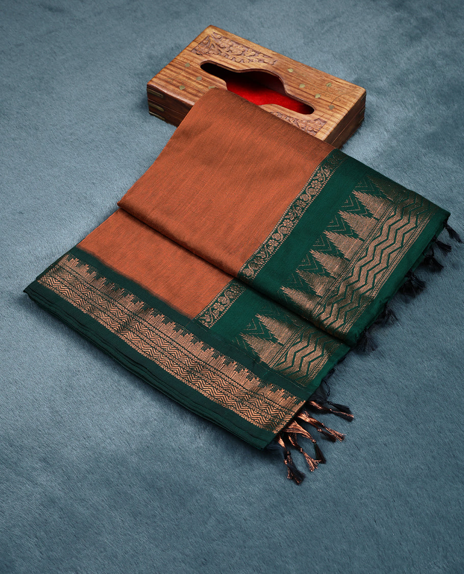 Burnt Orange Colour Mixed Kalyani Cotton Saree having Plain Body with Dark Green Colour Border and Blouse