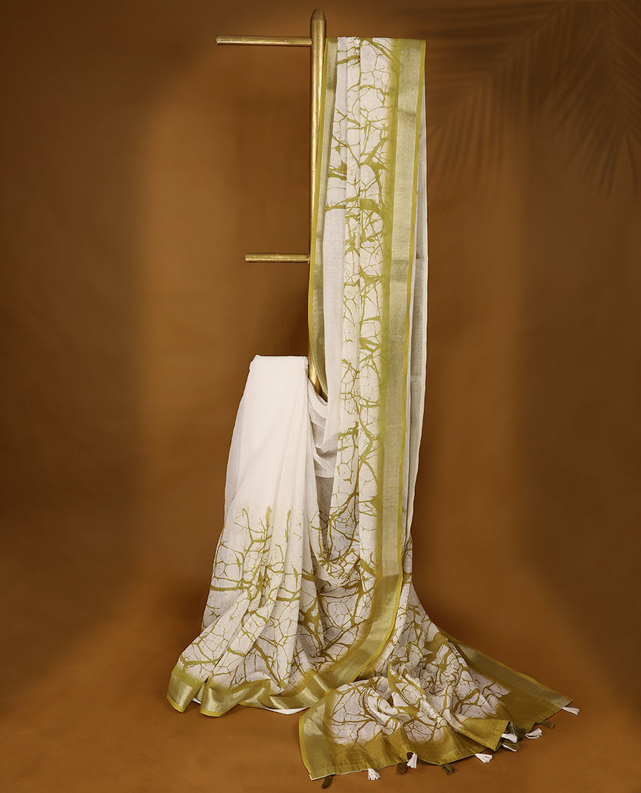 White cotton saree featuring light olive green abstract patterns and a soft matching border with Matching Blouse