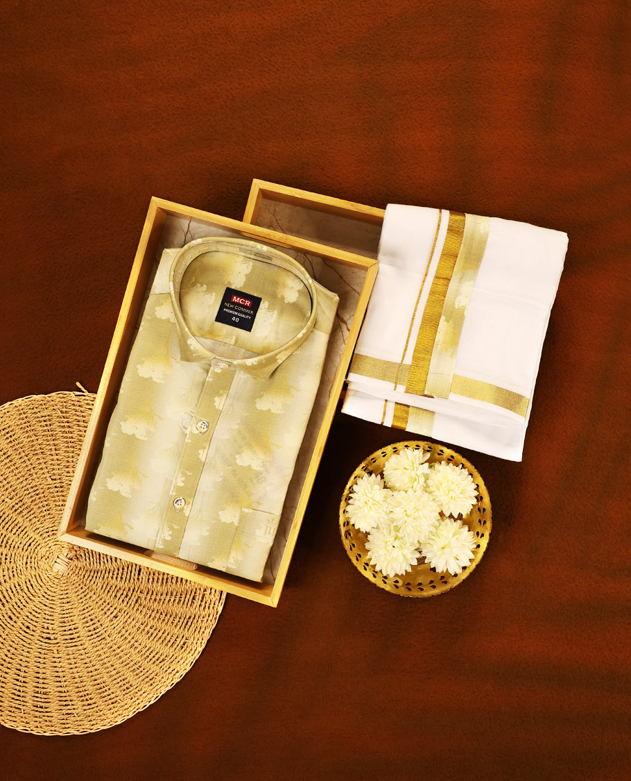 Deep Mustard colour MCR full sleeve shirt featuring all over abstract prints, paired with a white dhoti adorned with a rich golden zari kara and a matching deep Mustard printed border.