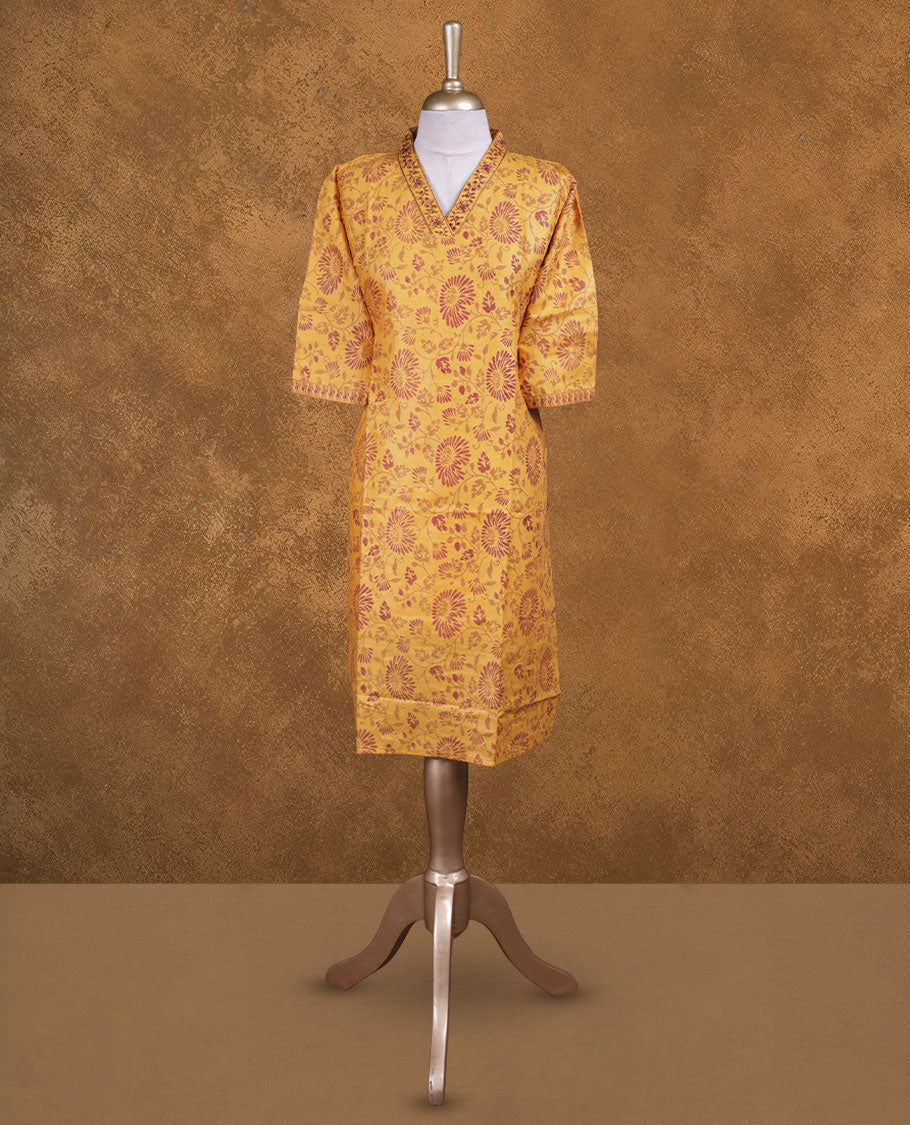 Mustard colour kurti with Maroon floral prints, knee length design, styled with thread pattern around neckline and a sleeve .