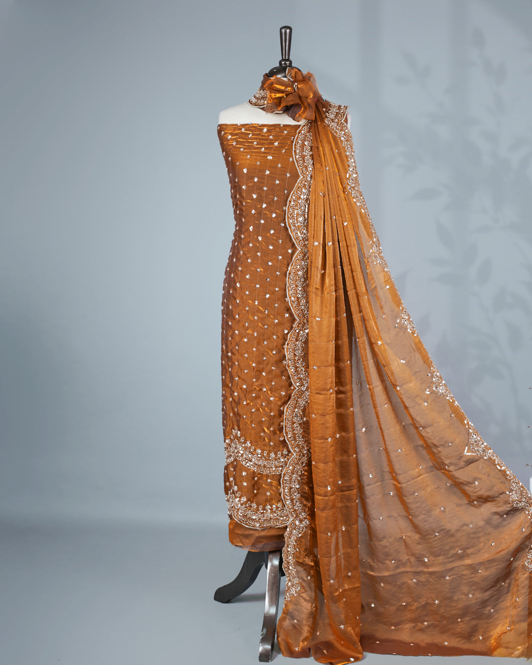 Bronze colour salwar material with Cut beats & sequins work on body, Matching Bottom & dupatta.