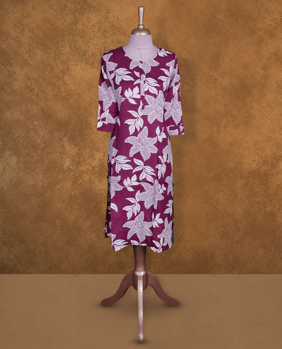 Purple and white colour kurti with White floral prints, knee length design, styled with a round neckline and a sleeve .