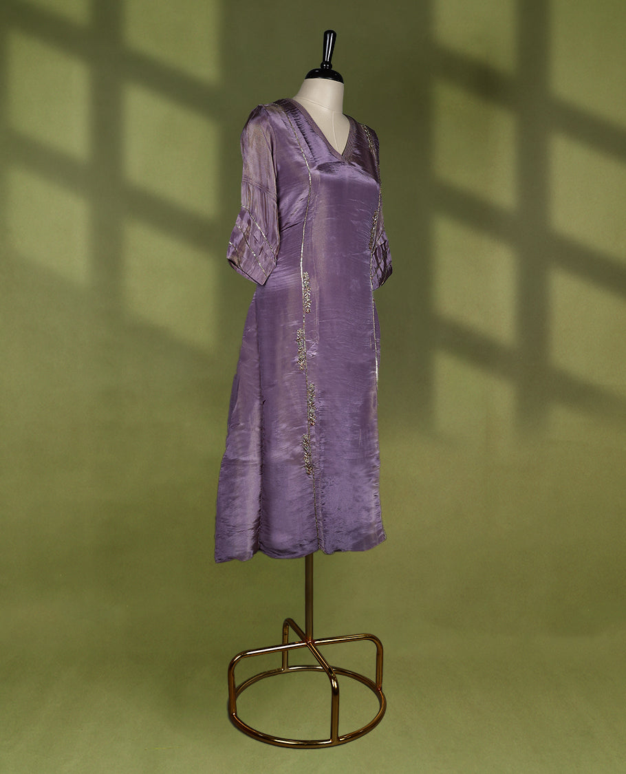 Pastel Purple coloured stylish kurthi without slit, featuring a V neck design adorned with intricate cut bead, sequin, and thread work, for women