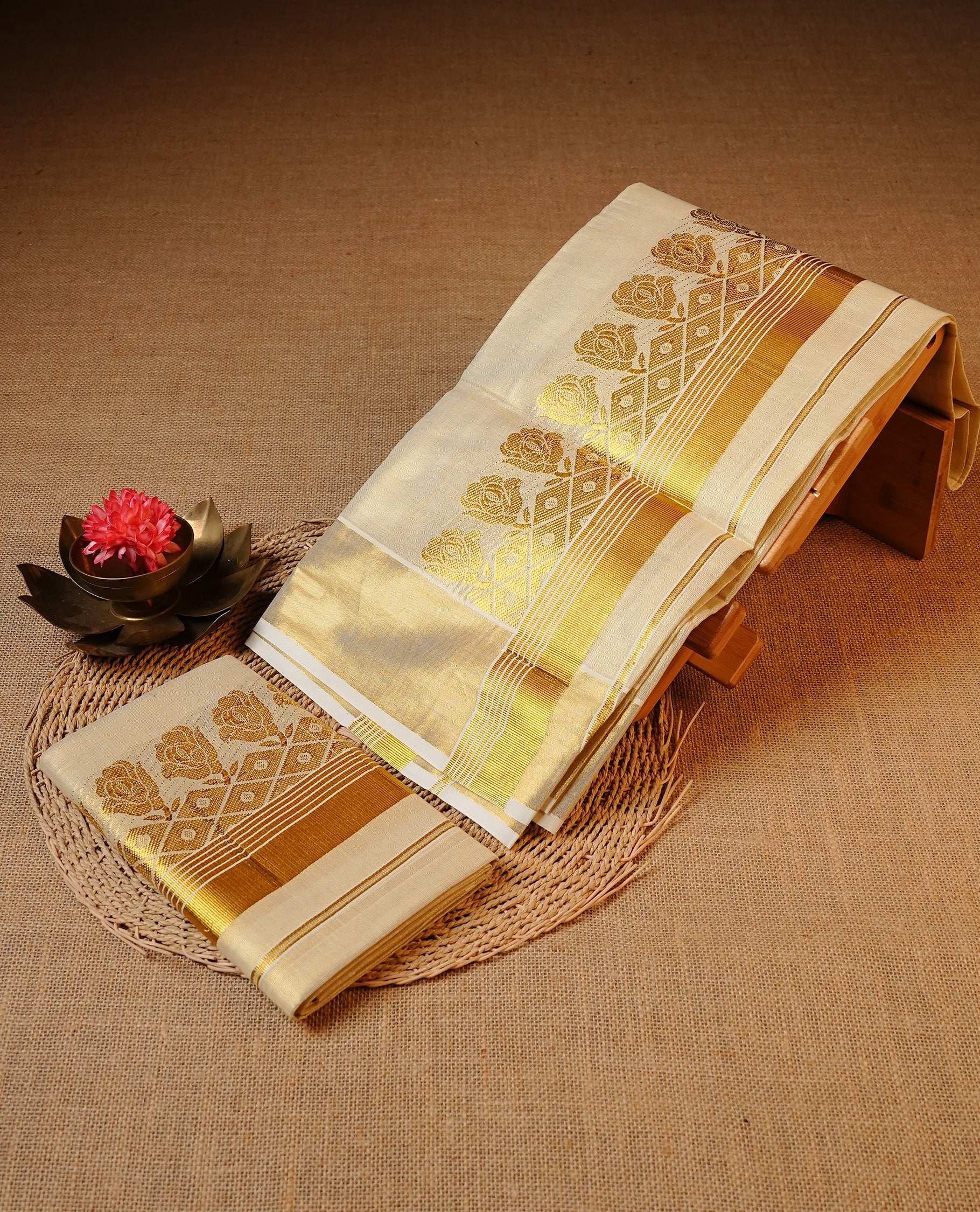 Cream colour Tissue silk set mund Featuring Elegant plain body, Complemented by Gold zari design with zari border.
