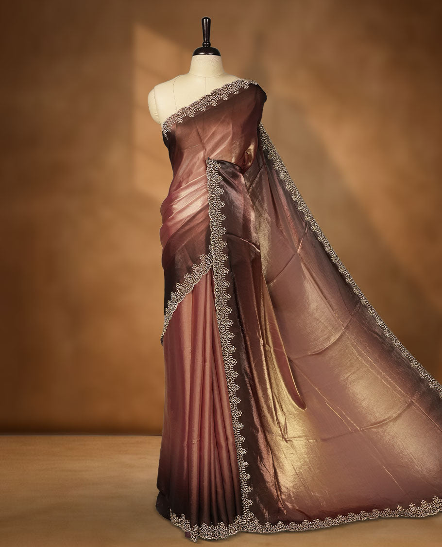 Dark Brown colour net shimmer fancy saree with a plain body, paired with a delicate stone worked border, with matching blouse