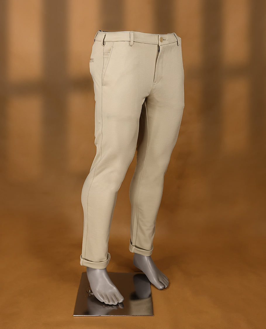 Cream colour IRONY plain formal pants for men.