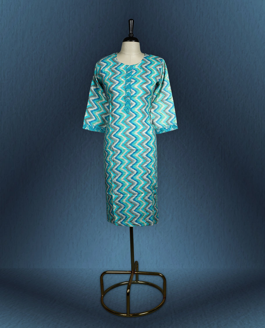 Aqua blue colour kurti with an all over zigzag pattern in shades of white and teal, styled with a round neckline featuring a short button placket, and complemented by three quarter sleeves