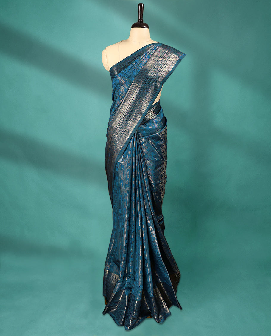 Blue Art Soft Silk Saree showcases intricate silver zari work on the body and border, paired with a matching blouse