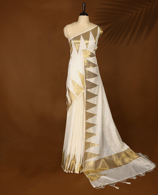 Elegant white colour soft  Tussar Kerala saree featuring Plain body, Gold kasavu Temple border, Paired with matching blouse offering a classic and graceful look