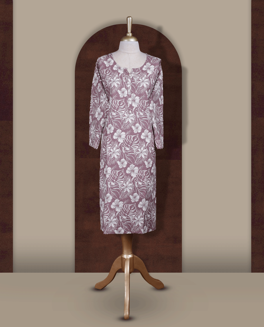 Mauve colour kurti adorned with elegant off white floral prints, Featuring a round neckline and three quarter sleeves.