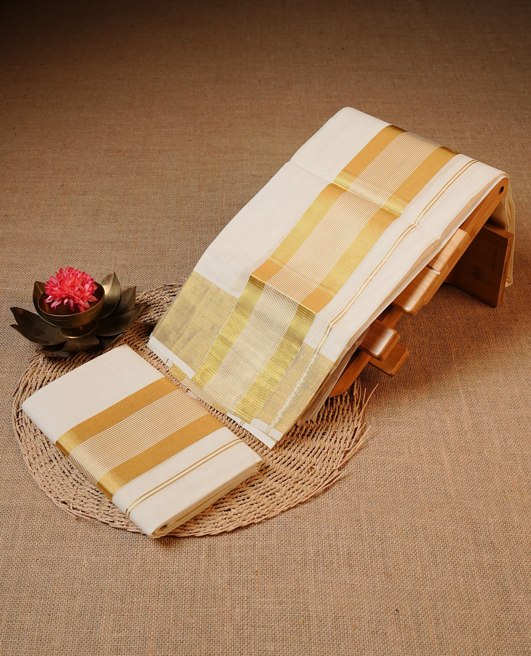 Off white colour Cotton Set Mund featuring a plain body, enhanced by a Traditional zari border.